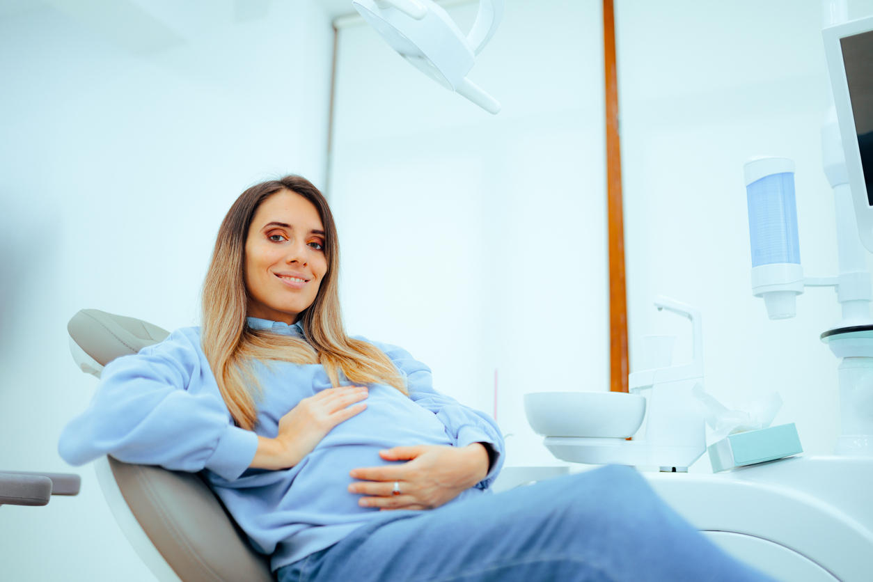 Pregnant patient sitting in the dntal chair