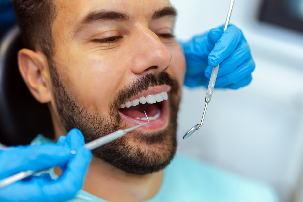 Patient receiving a dental exam