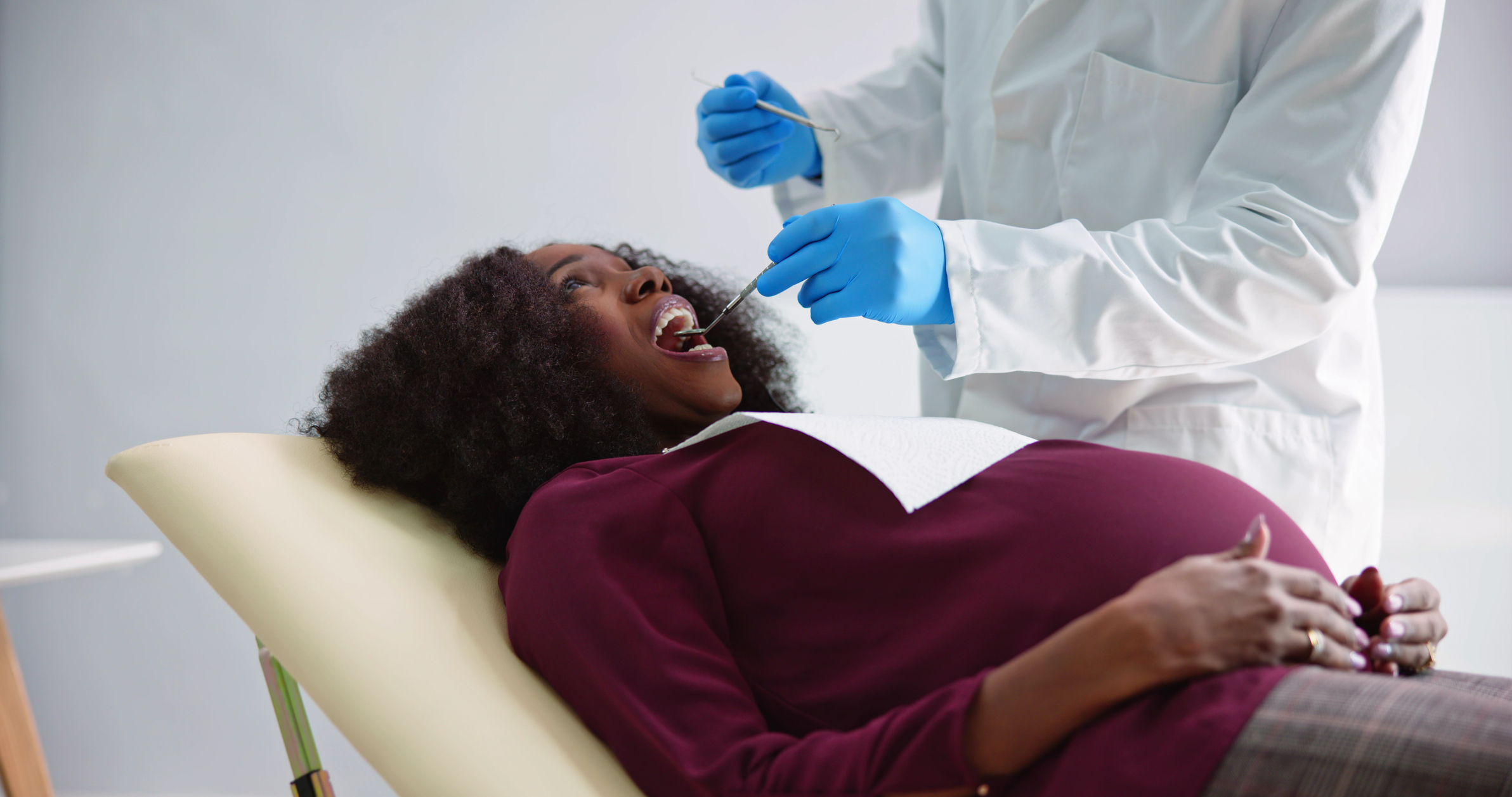 Pregnant patient receiving dental care