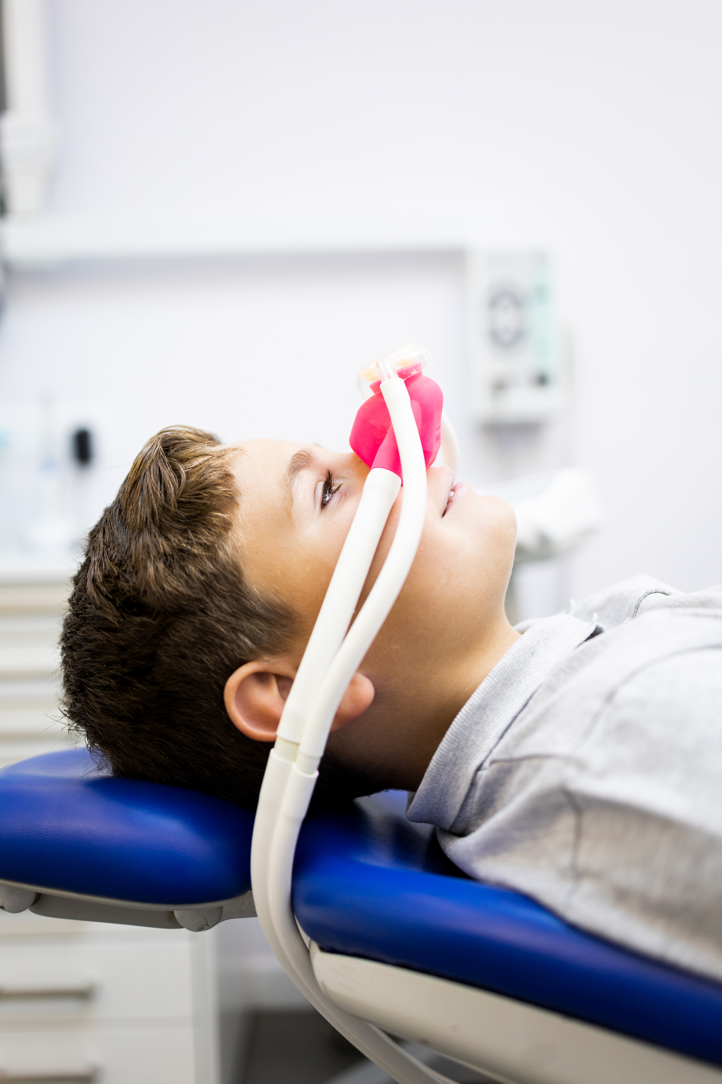 Patient in the dental office using laughing gas