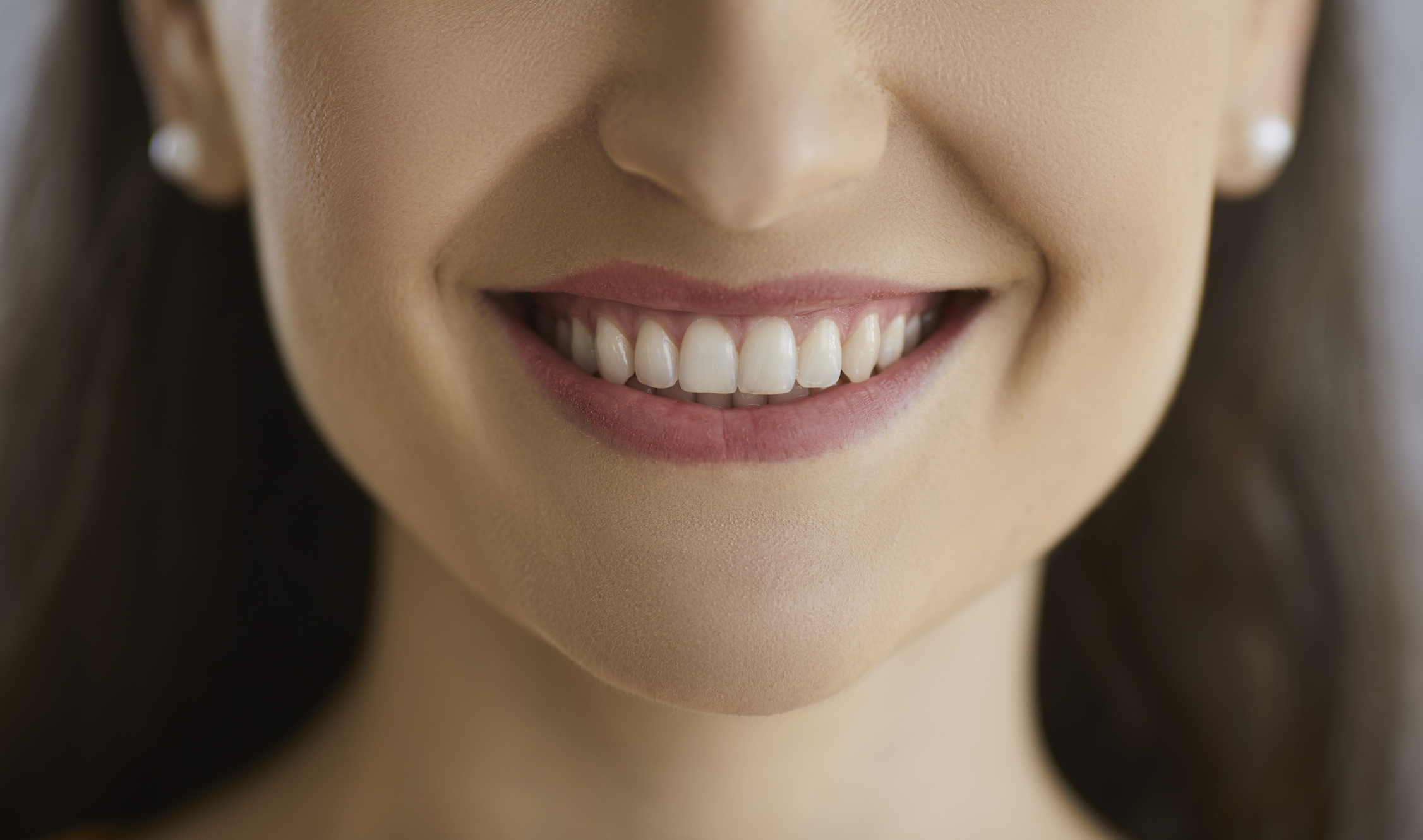Female with straight teeth
