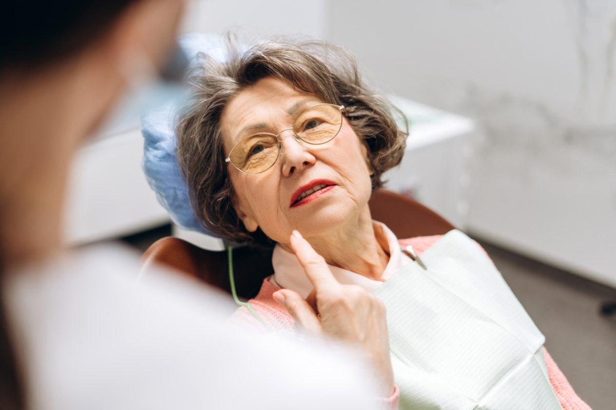 Senior talking with the dentist